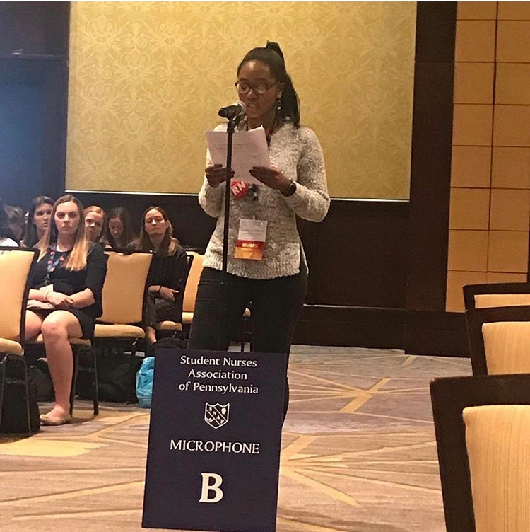 Alexandria N. Dawson, a CNHP BSN student and DUSNA Legislative Co-Chair 19-20', presenting a resolution at the state conference
